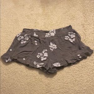 Olive and white flower patterned shorts